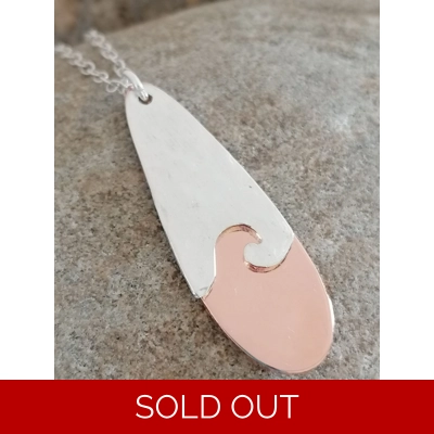 Double teardrop wave pendant